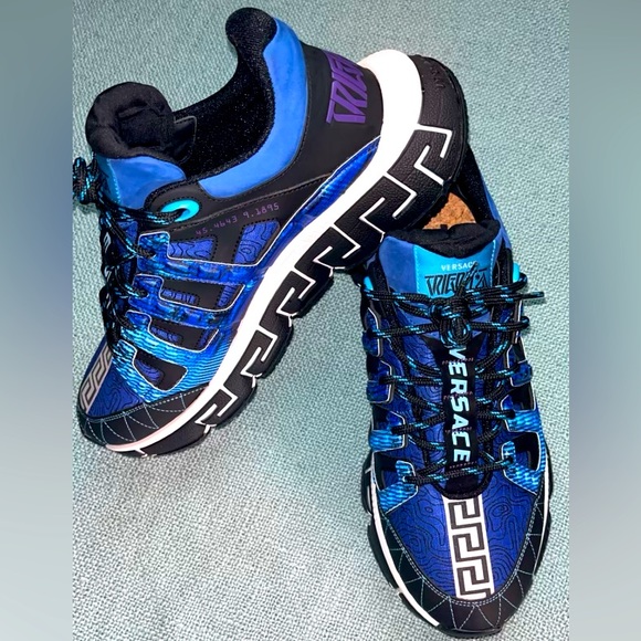 VersaceTrigreca panelled sneakers.
